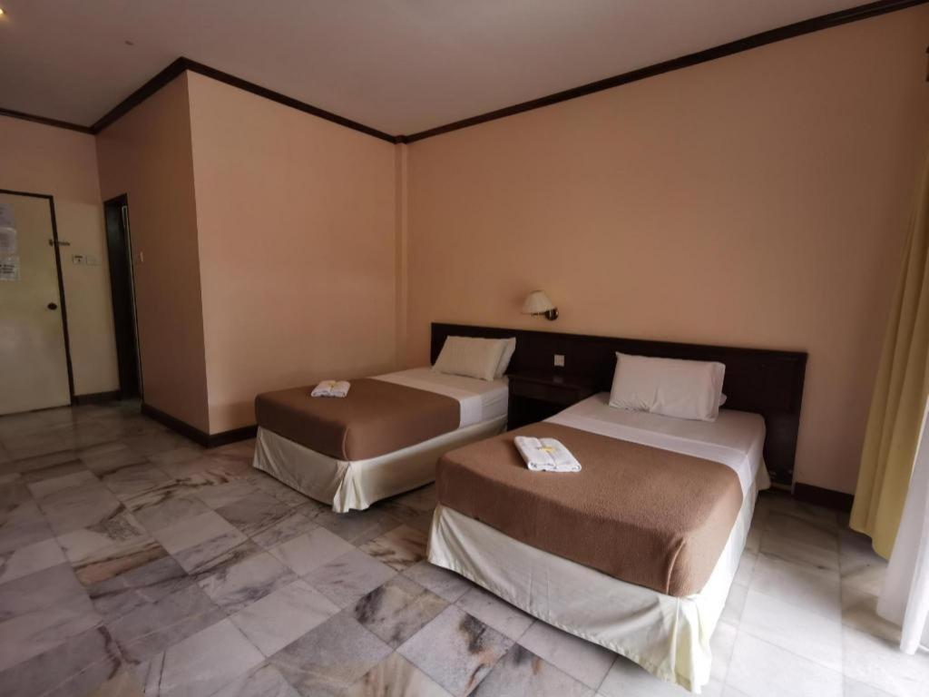 Oyo 89972 Borneo Paradise Beach Hotel Kota Kinabalu Extérieur photo